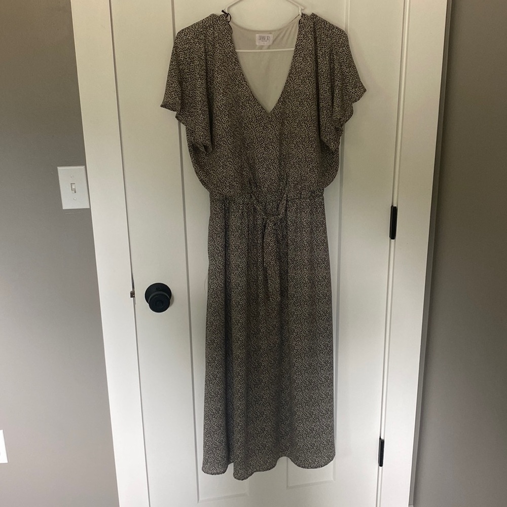 Sienna Sky cream and black dress